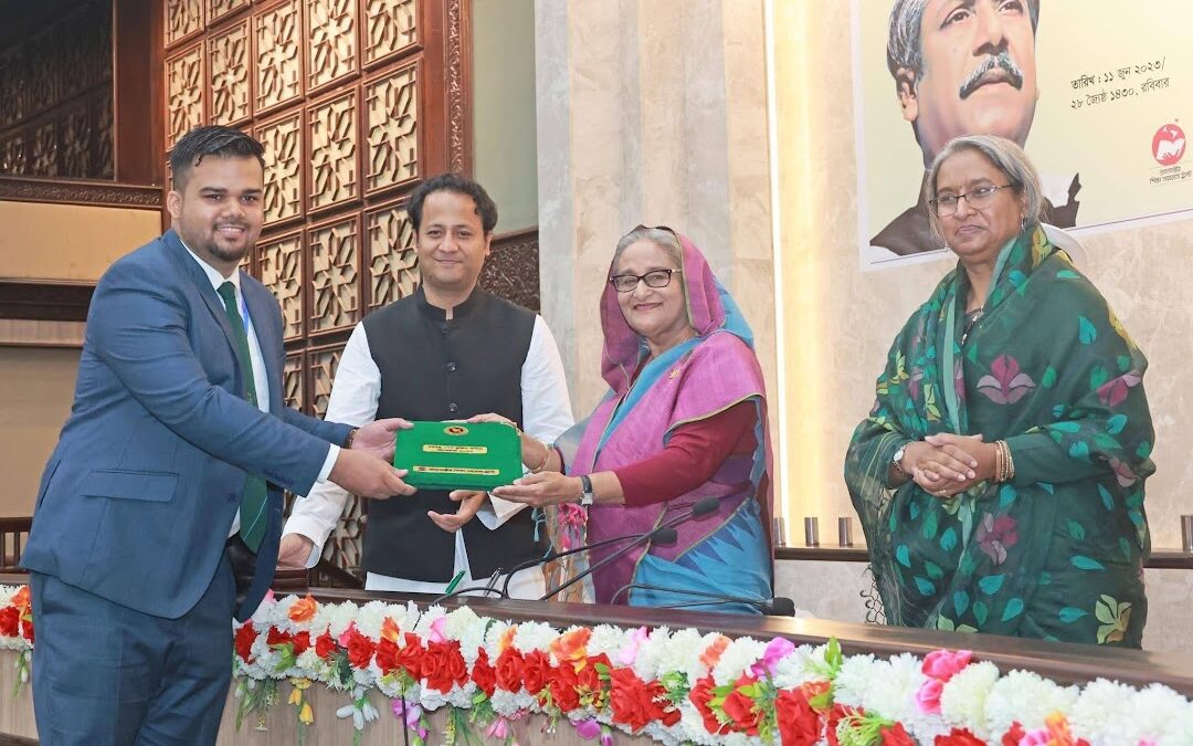 Receiving Bangabandhu Sheikh Mujib Scholar Award from the Prime Minister of Bangladesh Sheikh Hasina